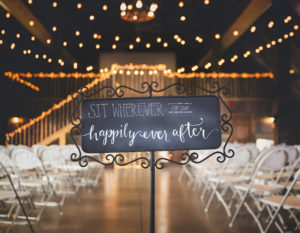Romantic and rustic, fall wedding inside the barn at Pedretti's Party Barn in Viroqua, Wisconsin